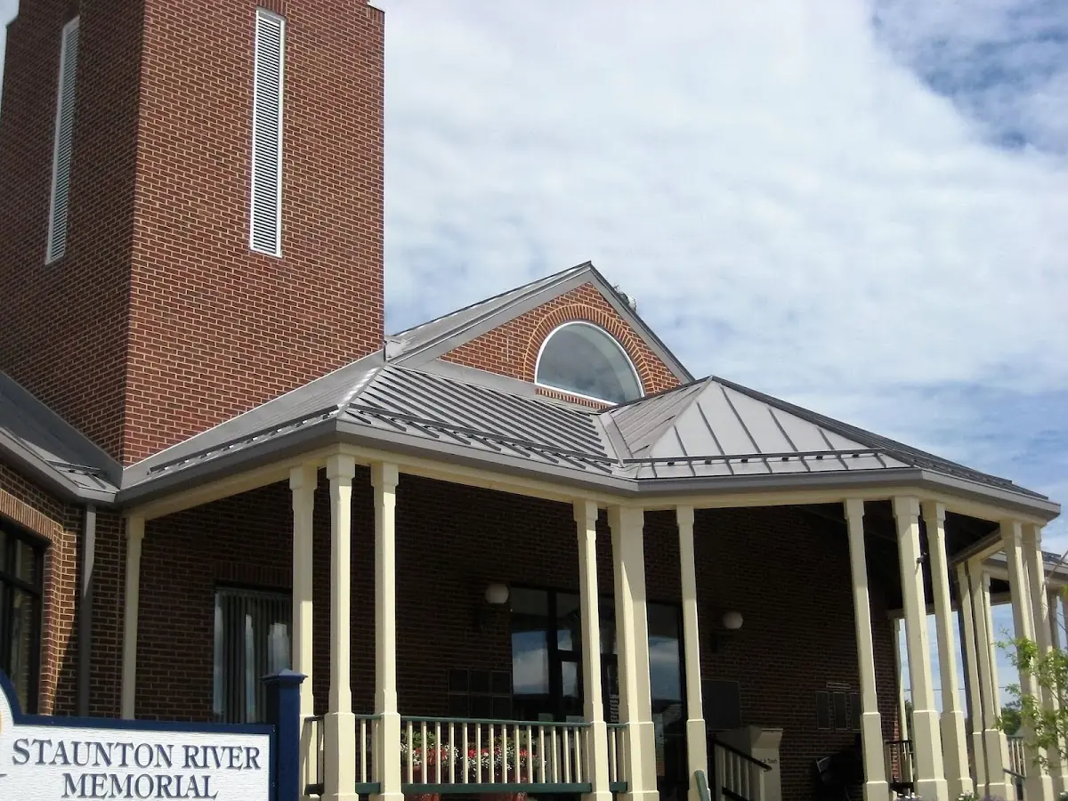 Skilled roofing craftsmen working on a residential roof in Christytown